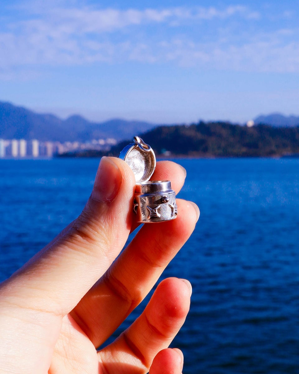 a solid sterling silver locket with stars design, handmade small container locket pendants
