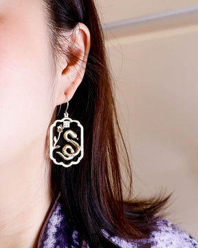 Handcrafted Year of the Snake earrings inspired by Chinese New Year 2025, designed by Scarlett Poon of Fake Plastic Love