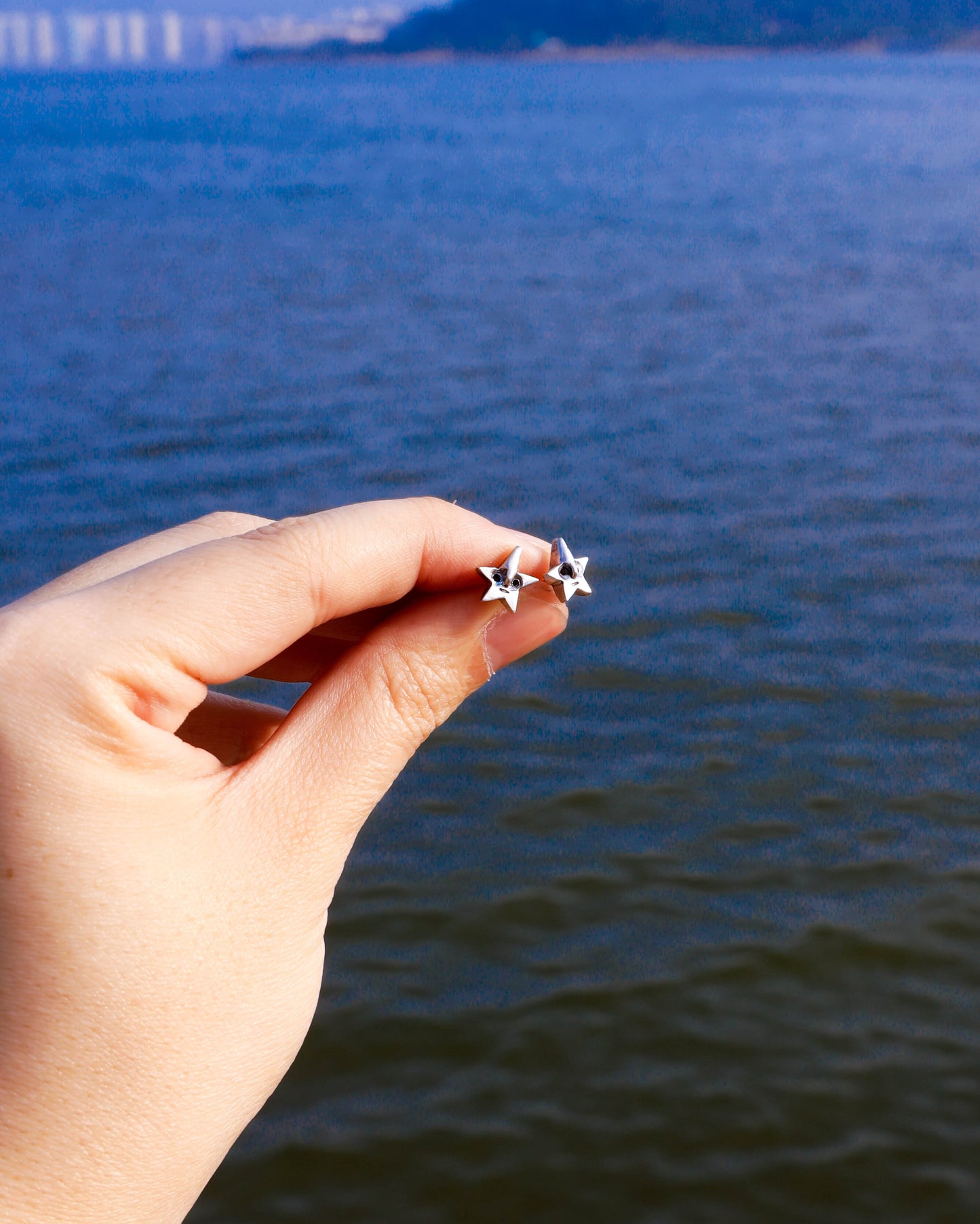 Tiny star face studs earrings, in sterling silver