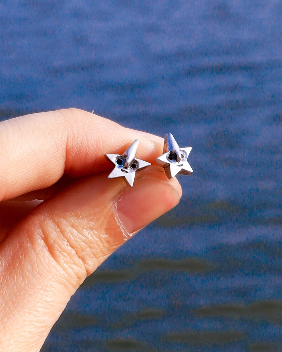 Tiny star face studs earrings in solid sterling silver