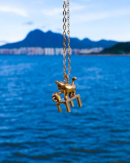 solid brass naughty kitty charm, cat pushing cup off table, set with cz stone, handmade jewellery, by fake plastic love