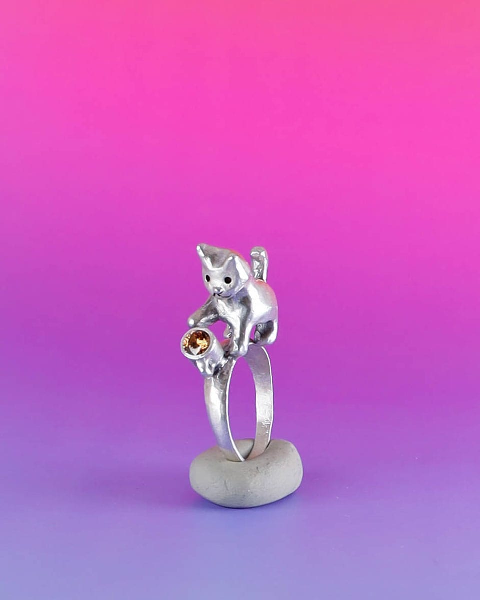 naughty kitty sterling silver ring, cat pushing cup off table, handmade jewellery, by fake plastic love