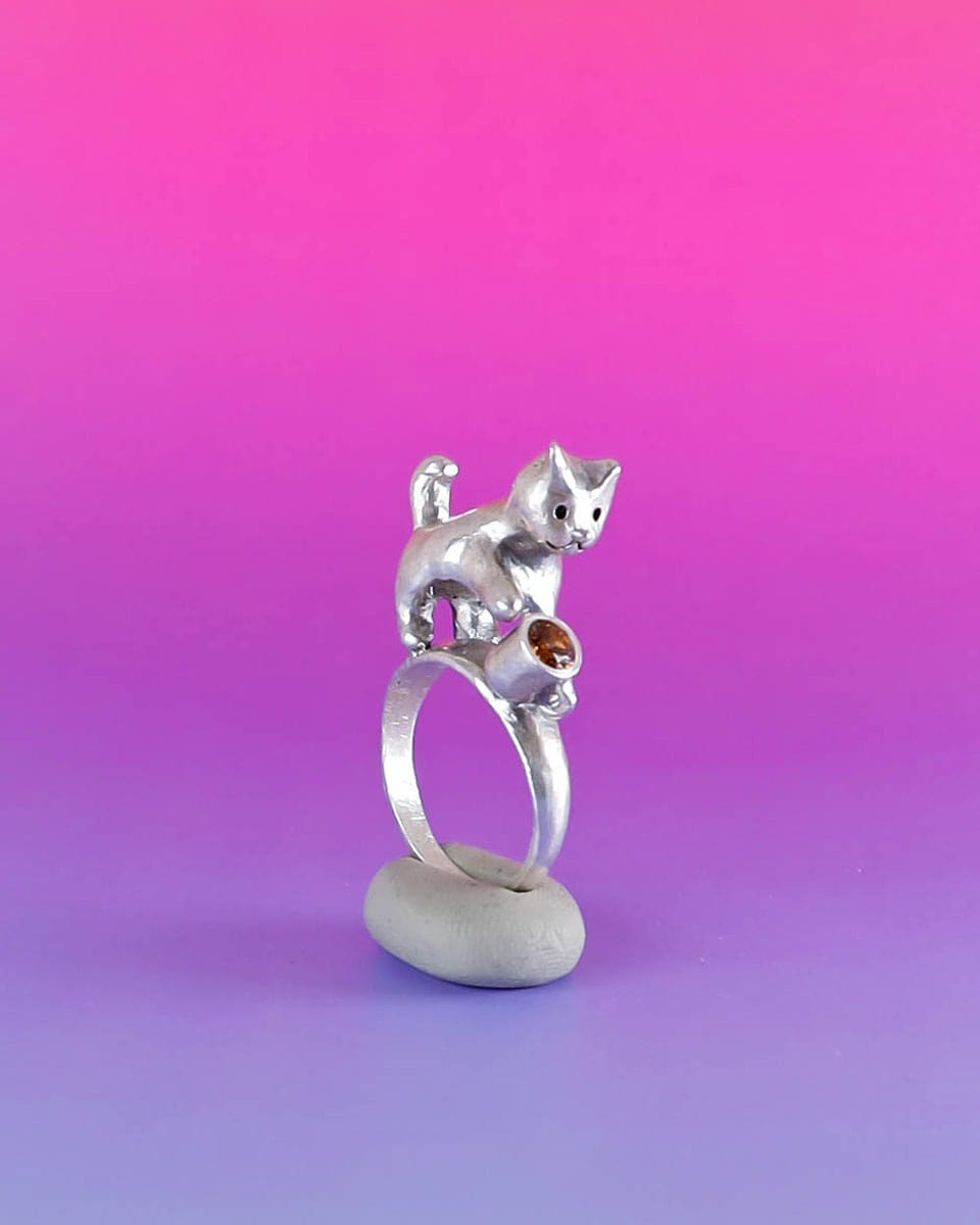 naughty kitty sterling silver ring, cat pushing cup off table, handmade jewellery, by fake plastic love