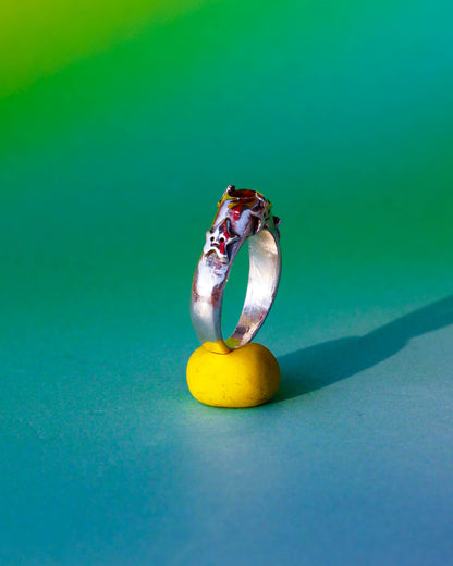 four stars sterling silver ring with a red garnet