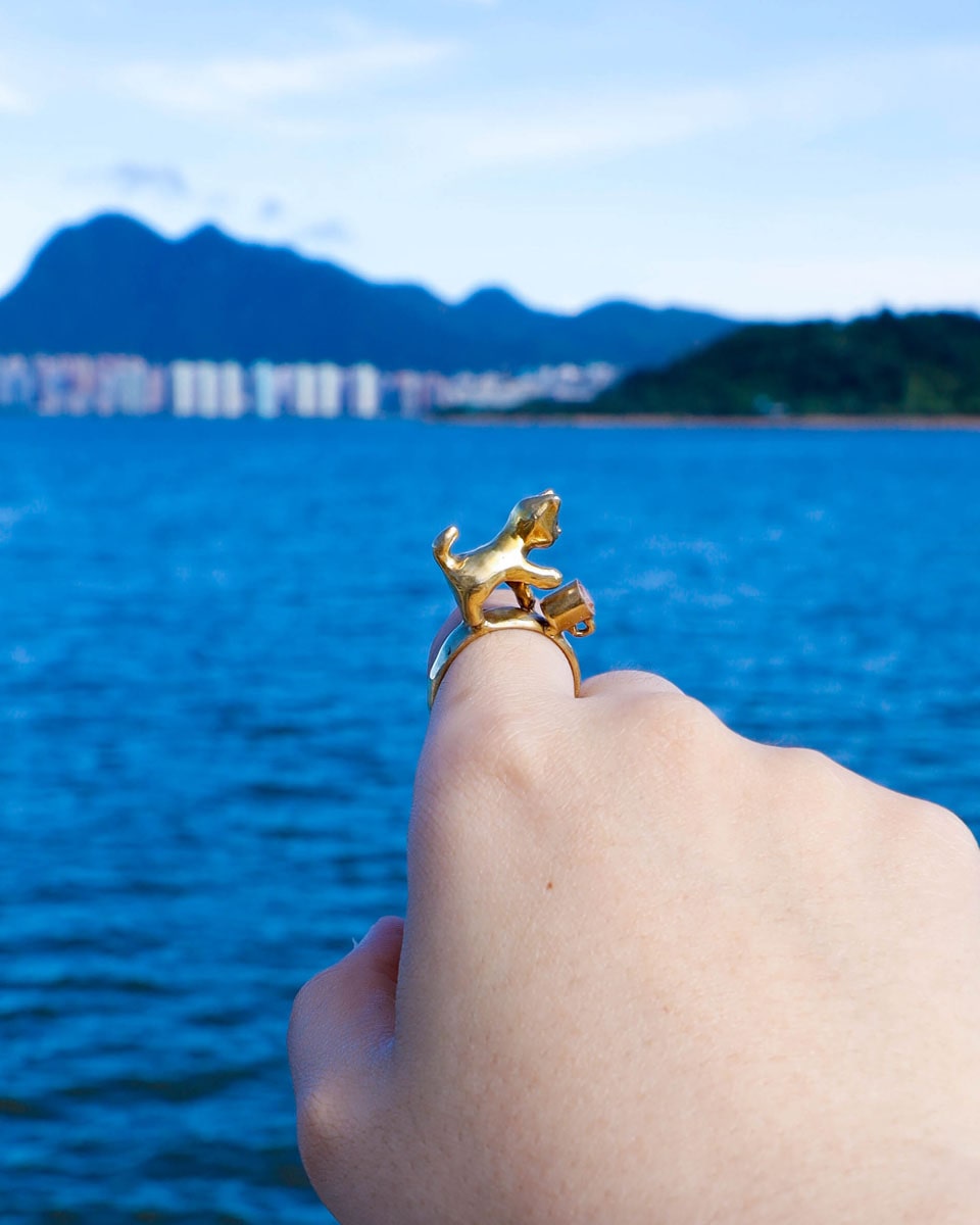 naughty kitty solid brass ring, cat pushing cup off ring band, set with cz stone, handmade jewellery, by fake plastic love