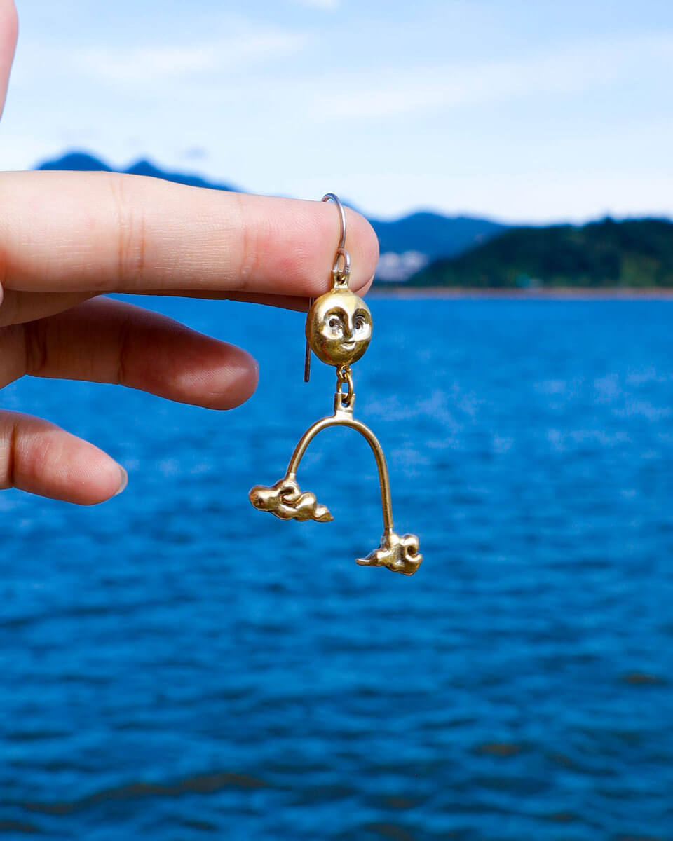The Moon's Blessing celestial dangle earring in solid brass, featuring a full moon and two auspicious cloud